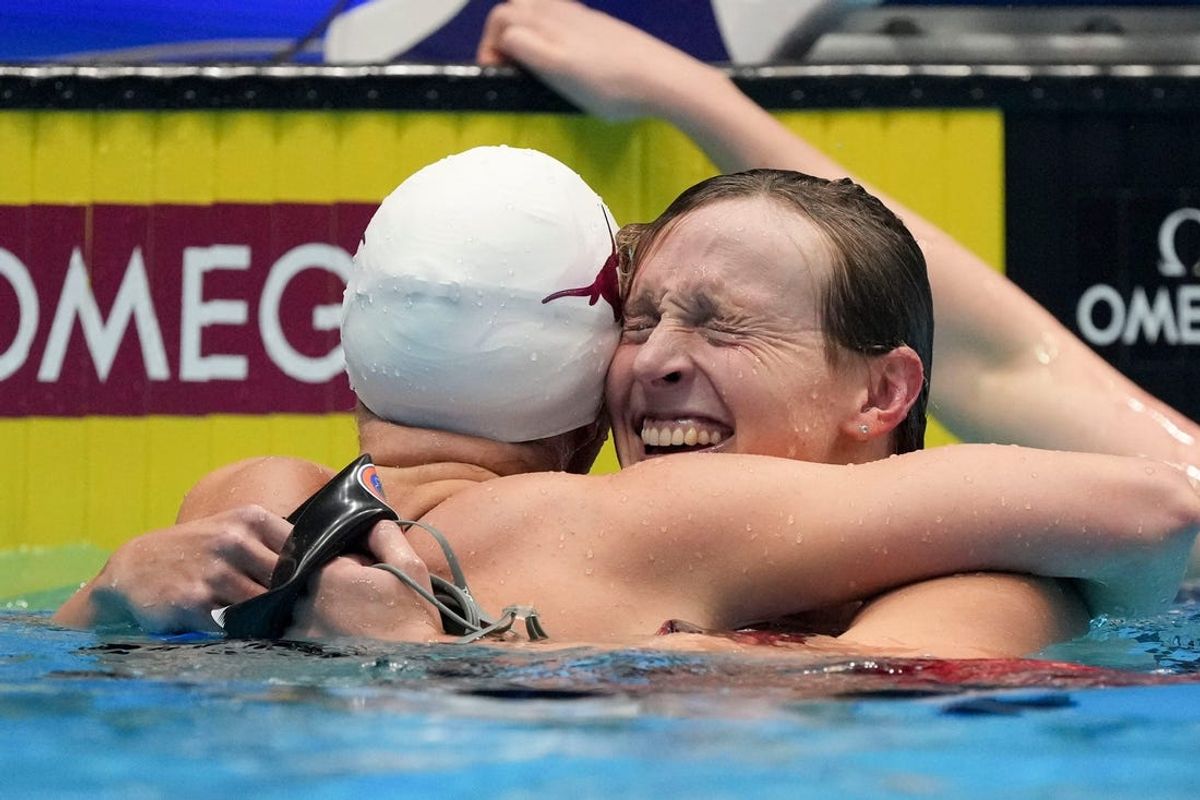 Katie Ledecky celebrates with Erin Gemmell after winning the 200-meter freestyle final Monday, June 17, 2024, during the third day of competition for the U.S. Olympic Team Swimming Trials at Lucas Oil Stadium in Indianapolis.