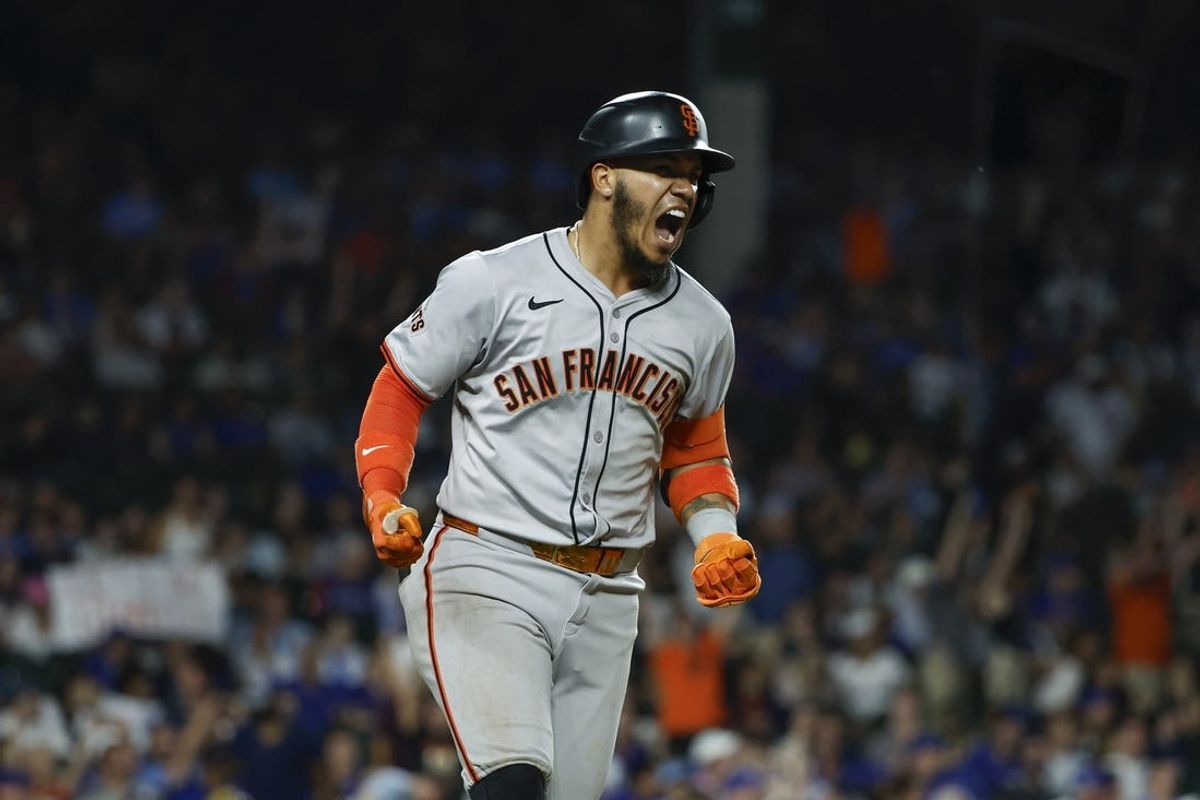 Jun 17, 2024; Chicago, Illinois, USA; San Francisco Giants second baseman Thairo Estrada (39) celebrates after hitting a three-run home run against the Chicago Cubs during the ninth inning at Wrigley Field. Mandatory Credit: Kamil Krzaczynski-USA TODAY Sports
