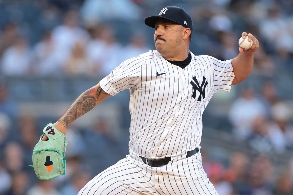 Jun 18, 2024; Bronx, New York, USA; New York Yankees starting pitcher Nestor Cortes (65) delivers a pitch during the first inning against the Baltimore Orioles at Yankee Stadium. Mandatory Credit: Vincent Carchietta-USA TODAY Sports