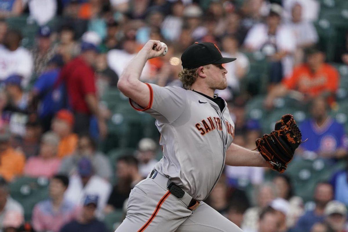 Jun 18, 2024; Chicago, Illinois, USA; San Francisco Giants pitcher Logan Webb (62) throws the ball against the Chicago Cubs during the first inning at Wrigley Field. Mandatory Credit: David Banks-USA TODAY Sports