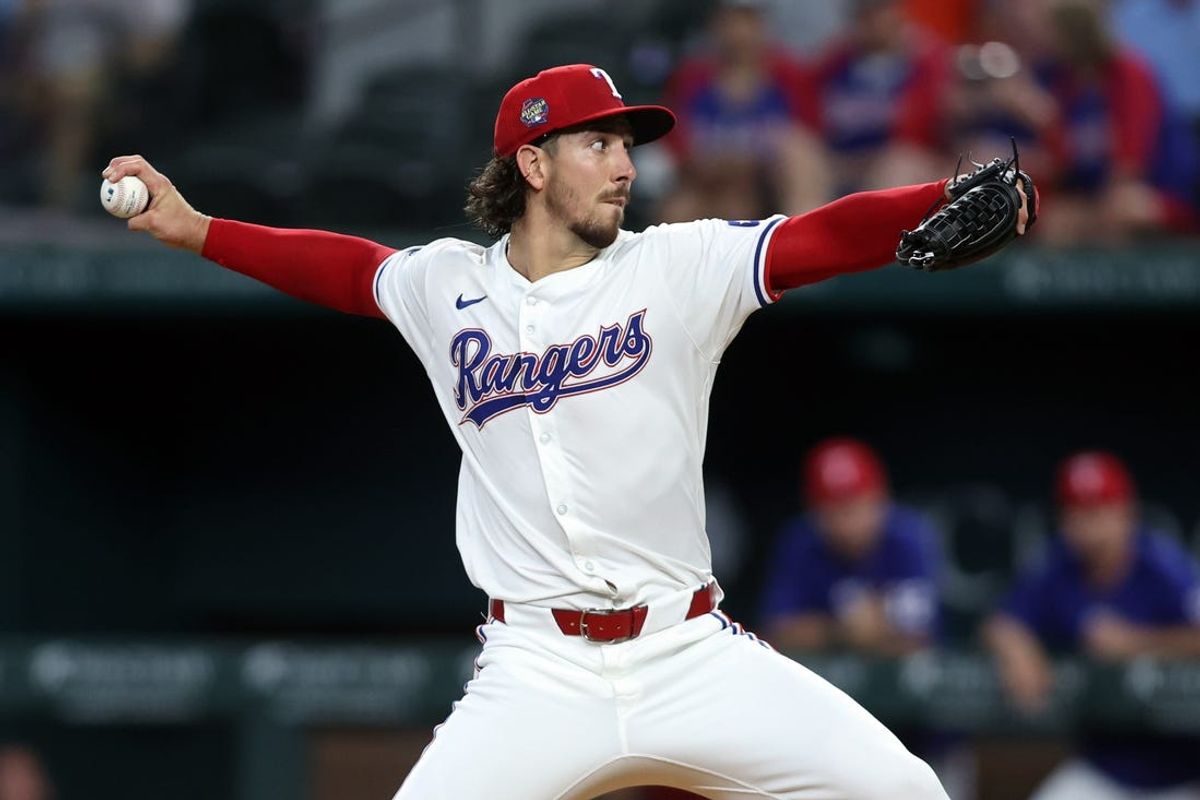 Jun 18, 2024; Arlington, Texas, USA;  Texas Rangers pitcher Michael Lorenzen (23) throws a pitch in the first inning against the New York Mets at Globe Life Field. Mandatory Credit: Tim Heitman-USA TODAY Sports