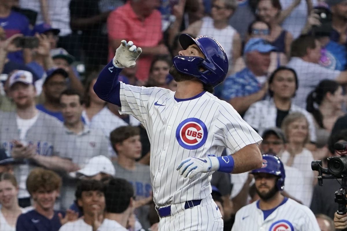 Jun 18, 2024; Chicago, Illinois, USA; Chicago Cubs shortstop Dansby Swanson (7) gestures after hitting a two-run home run against the San Francisco Giants during the second inning at Wrigley Field. Mandatory Credit: David Banks-USA TODAY Sports