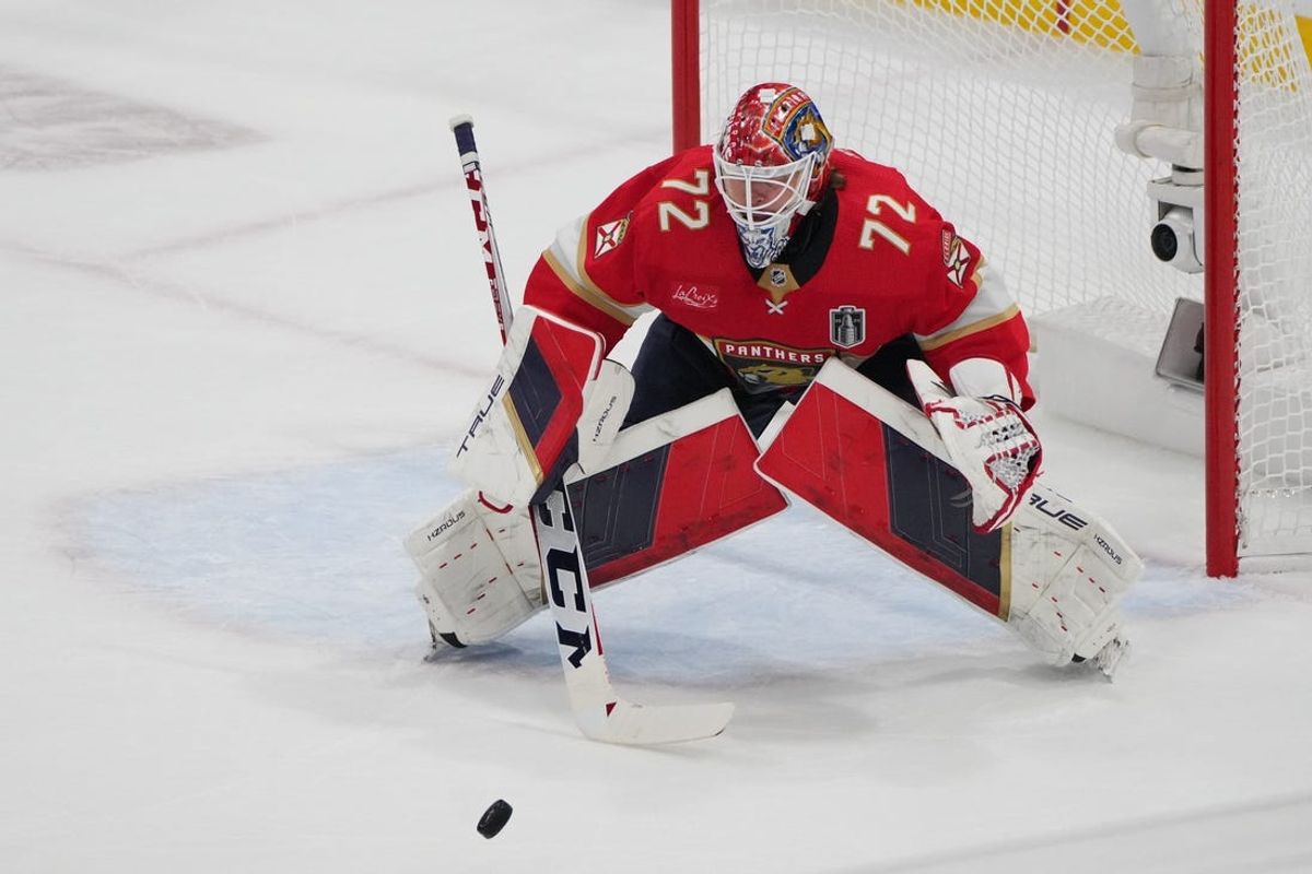 Jun 18, 2024; Sunrise, Florida, USA; Florida Panthers goaltender Sergei Bobrovsky (72) blocks a shot on net during the first period against the Edmonton Oilers in game five of the 2024 Stanley Cup Final at Amerant Bank Arena. Mandatory Credit: Jim Rassol-USA TODAY Sports