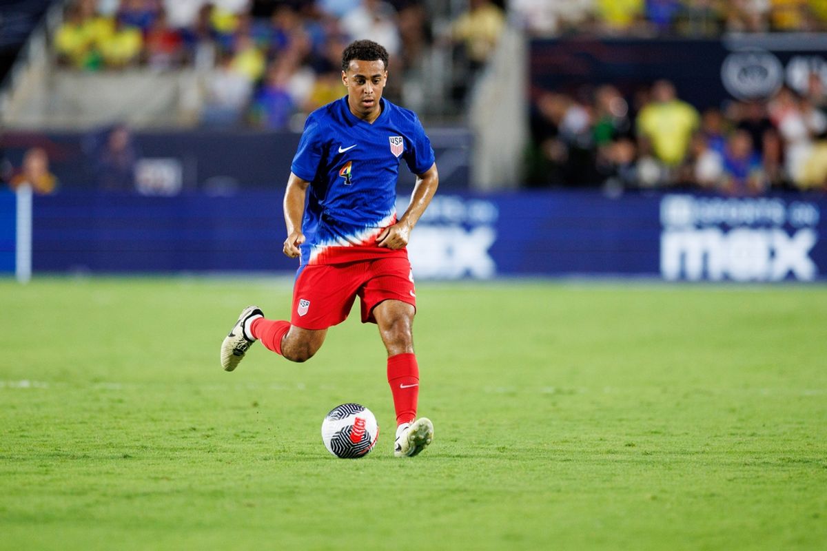 Jun 12, 2024; Orlando, Florida, USA;  United States midfielder Tyler Adams (4) controls the ball against Brazil in the second half during the Continental Clasico at Camping World Stadium. Mandatory Credit: Nathan Ray Seebeck-USA TODAY Sports