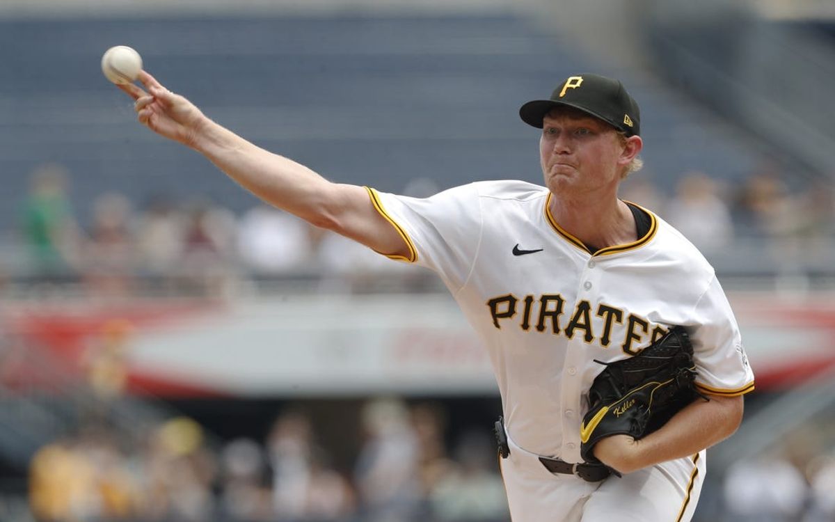 Jun 19, 2024; Pittsburgh, Pennsylvania, USA;  Pittsburgh Pirates starting pitcher Mitch Keller (23) delivers a pitch against the Cincinnati Reds during the first inning at PNC Park. Mandatory Credit: Charles LeClaire-USA TODAY Sports