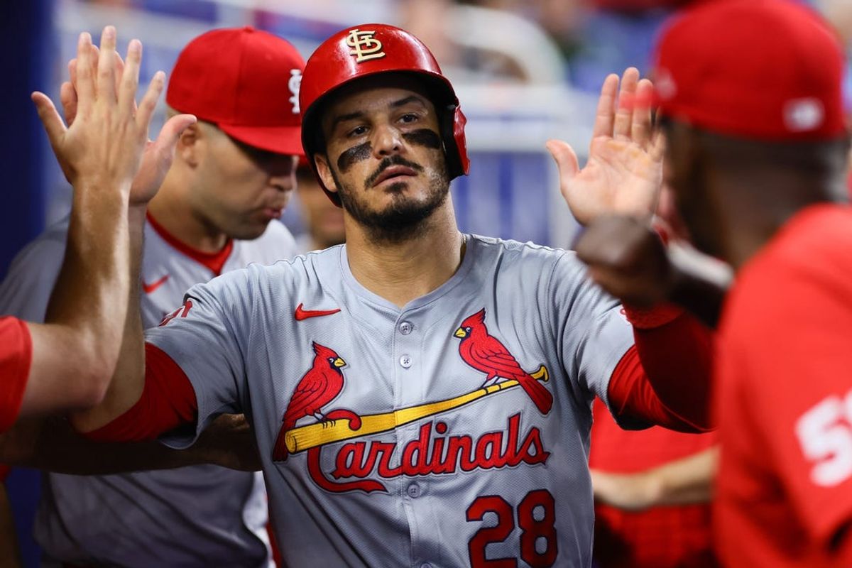 Jun 19, 2024; Miami, Florida, USA; St. Louis Cardinals third baseman Nolan Arenado (28) celebrates after scoring against the Miami Marlins during the second inning at loanDepot Park. Mandatory Credit: Sam Navarro-USA TODAY Sports