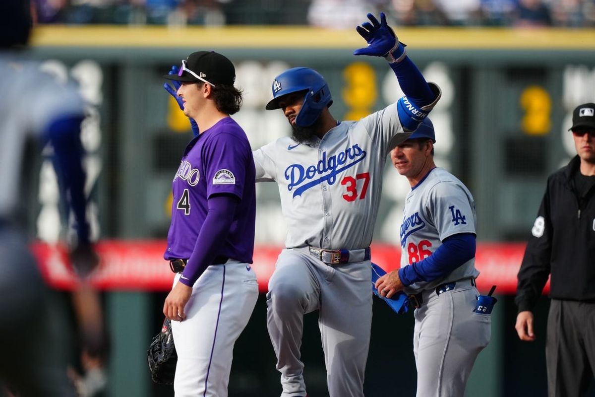 Jun 19, 2024; Denver, Colorado, USA; Los Angeles Dodgers left fielder Teoscar Hernández (37) following his single in the first inning against the Colorado Rockies at Coors Field. Mandatory Credit: Ron Chenoy-USA TODAY Sports