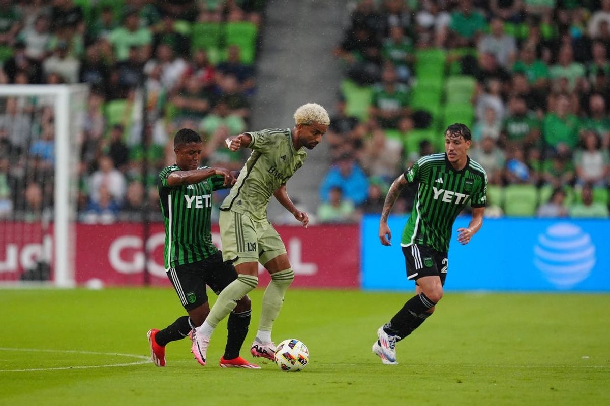 Jun 19, 2024; Austin, Texas, USA; Los Angeles FC midfielder Timothy Tillman (11) controls the ball in front of Austin FC midfielder Jhojan Valencia (5) in the first half at Q2 Stadium. Mandatory Credit: Daniel Dunn-USA TODAY Sports