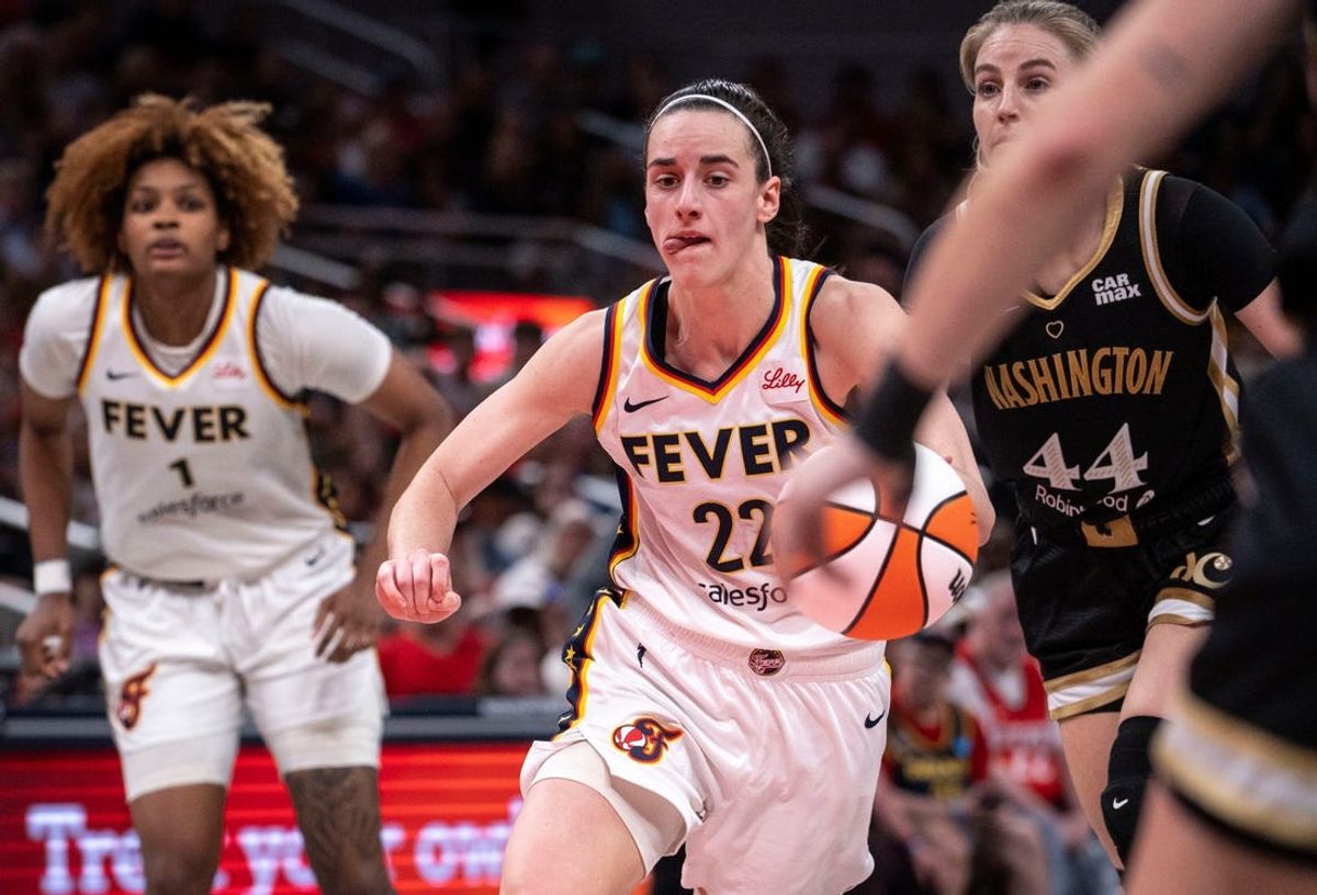 Indiana Fever guard Caitlin Clark (22) rushes up the court Wednesday, June 19, 2024, during the game at Gainbridge Fieldhouse in Indianapolis. The Indiana Fever defeated the Washington Mystics, 88 - 81. The Indiana Fever defeated the Washington Mystics, 88 - 81.