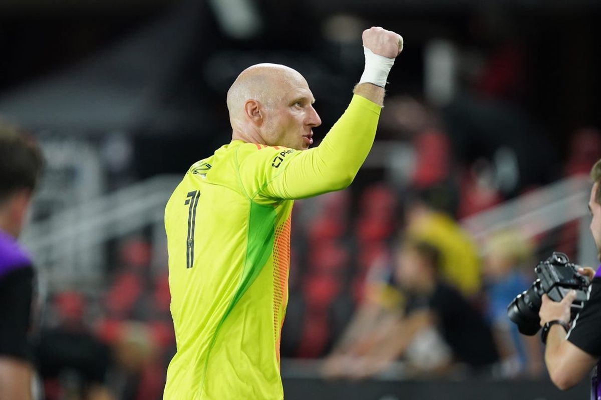 Jun 19, 2024; Washington, District of Columbia, USA; Atlanta United goalkeeper Brad Guzan (1) celebrates after the match against D.C. United at Audi Field. Mandatory Credit: Amber Searls-USA TODAY Sports