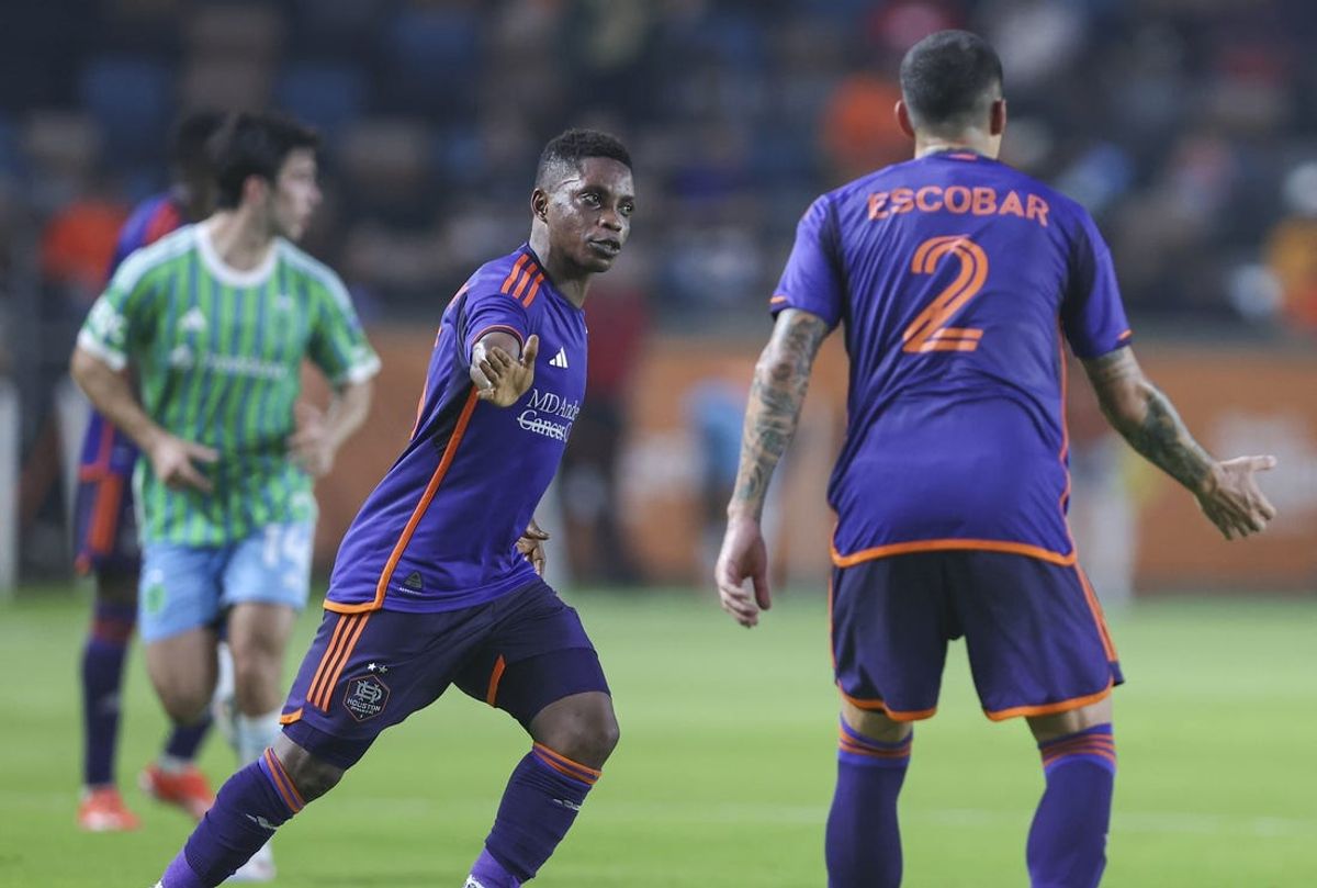 Jun 19, 2024; Houston, Texas, USA; Houston Dynamo FC midfielder Latif Blessing (15) celebrates after scoring a goal during the first half against Seattle Sounders FC at Shell Energy Stadium. Mandatory Credit: Troy Taormina-USA TODAY Sports