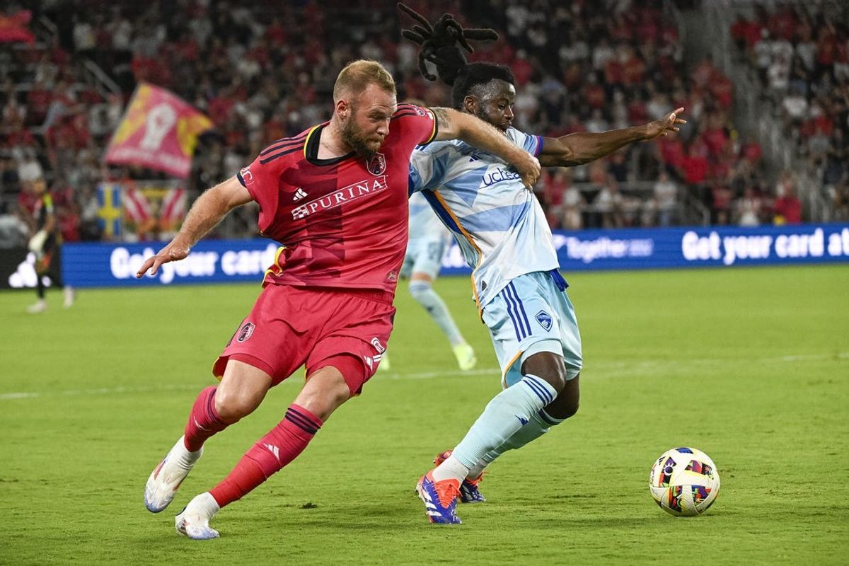 Jun 19, 2024; St. Louis, Missouri, USA; St. Louis CITY SC forward Joao Klauss (9) and Colorado Rapids defender Lalas Abubakar (6) battle at CITYPARK. Mandatory Credit: Scott Rovak-USA TODAY Sports