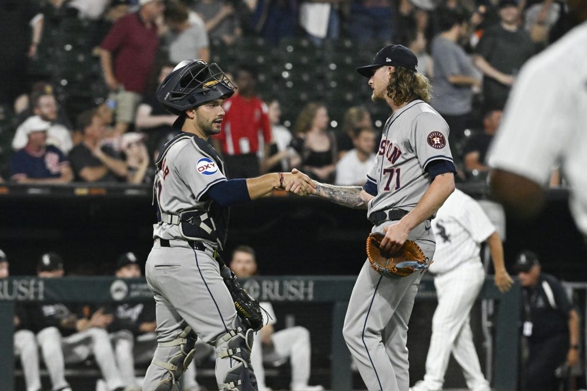 Jun 19, 2024; Chicago, Illinois, USA;  Houston Astros catcher César Salazar (18) and pitcher Josh Hader (71) after the game against the Chicago White Sox at Guaranteed Rate Field. Mandatory Credit: Matt Marton-USA TODAY Sports
