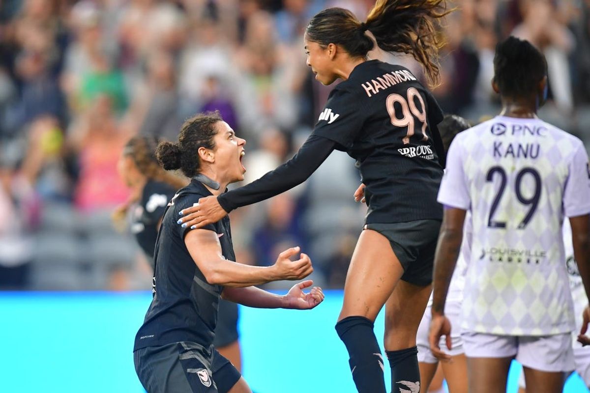Jun 19, 2024; Los Angeles, California, USA; Angel City FC midfielder Rocky Rodriguez (7) celebrates with defender Madison Hammond (99) after scoring a goal against Racing Louisville FC in the first half at BMO Stadium. Mandatory Credit: Gary A. Vasquez-USA TODAY Sports