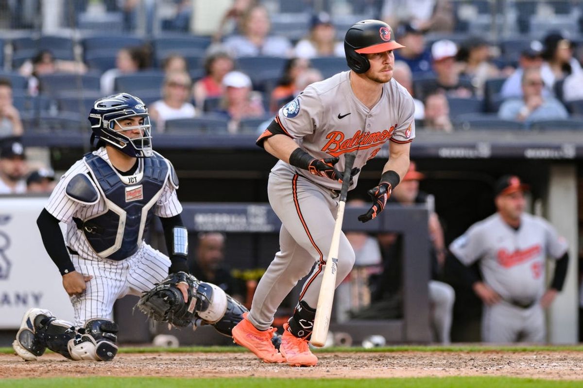 Jun 20, 2024; Bronx, New York, USA; Baltimore Orioles first baseman Ryan O'Hearn (32) hits a two-RBI single against the New York Yankees during the eighth inning at Yankee Stadium. Mandatory Credit: John Jones-USA TODAY Sports