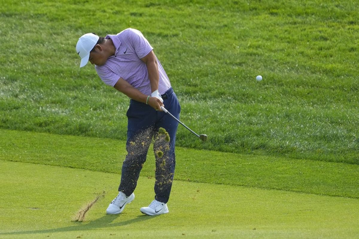 Jun 21, 2024; Cromwell, Connecticut, USA; Tom Kim hits the ball in the first hole fairway during the second round of the Travelers Championship golf tournament at TCP River Highlands. Mandatory Credit: Gregory Fisher-USA TODAY Sports