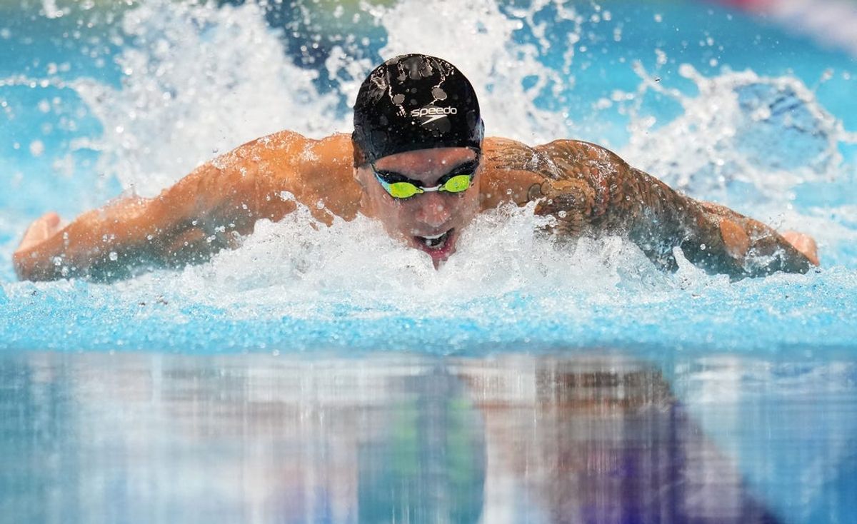 Caeleb Dressel competes in the 100-meter butterfly semifinals, Friday, June 21, 2024, during the seventh day of the U.S. Olympic Team Swimming Trials at Lucas Oil Stadium in Indianapolis.