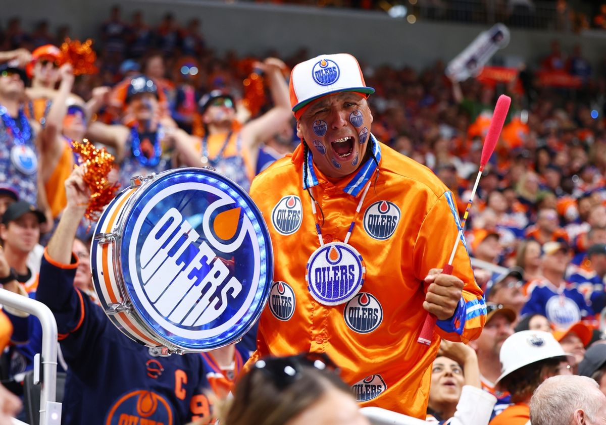 June 21, 2024; Edmonton, Alberta, CAN;  A fan of the Edmonton Oilers bangs a drum in the second period against the Florida Panthers in game six of the 2024 Stanley Cup Final at Rogers Place. Mandatory Credit: Sergei Belski-USA TODAY Sports