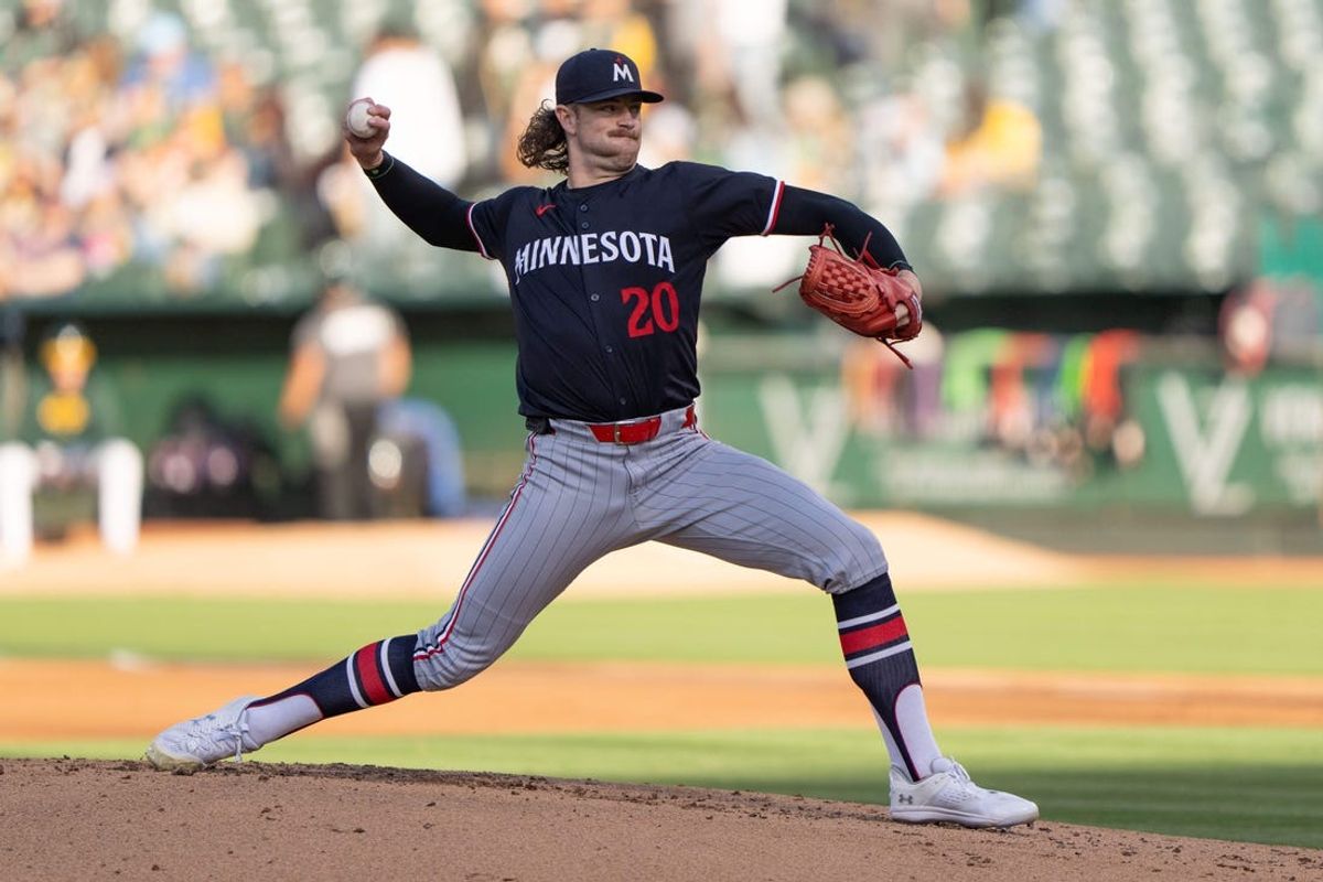 Jun 21, 2024; Oakland, California, USA; Minnesota Twins pitcher Chris Paddack (20) pitches against the Oakland Athletics during the first inning at Oakland-Alameda County Coliseum. Mandatory Credit: Stan Szeto-USA TODAY Sports
