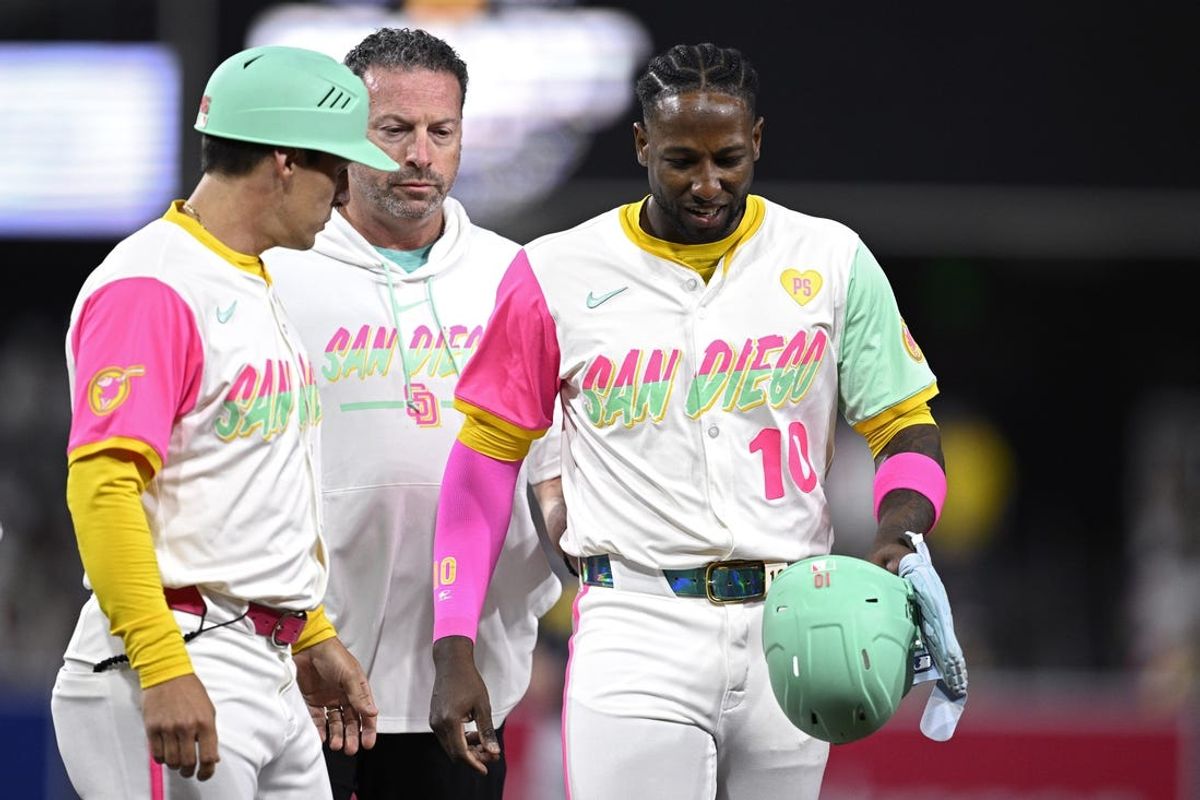 Jun 21, 2024; San Diego, California, USA; San Diego Padres left fielder Jurickson Profar (10) leaves the game with an apparent injury during the seventh inning against the Milwaukee Brewers at Petco Park. Mandatory Credit: Orlando Ramirez-USA TODAY Sports