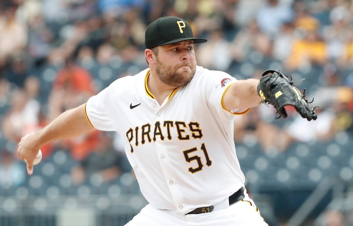 Jun 19, 2024; Pittsburgh, Pennsylvania, USA;  Pittsburgh Pirates relief pitcher David Bednar (51) pitches against the Cincinnati Reds during the ninth inning at PNC Park. Mandatory Credit: Charles LeClaire-USA TODAY Sports