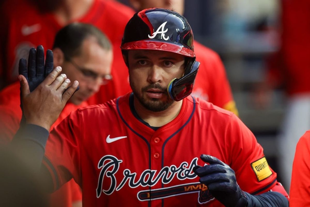 Apr 19, 2024; Atlanta, Georgia, USA; Atlanta Braves catcher Travis d'Arnaud (16) celebrates with teammates after a home run against the Texas Rangers in the second inning at Truist Park.