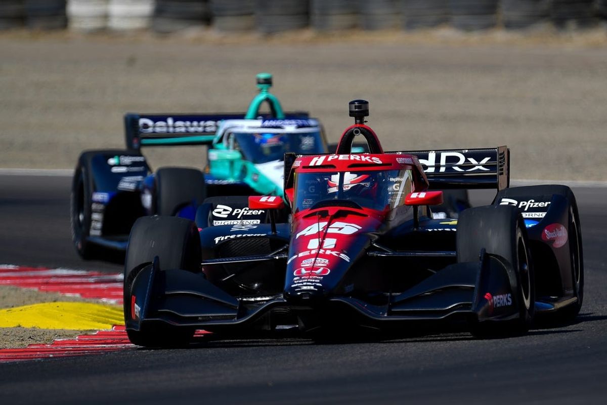 Jun 22, 2024; Salinas, California, USA; Rahal Letterman Lanigan Racing driver Christian Lundgaard (45) of Denmark leads Andretti Autosport driver Marcus Ericsson (28) of Sweden during practice at WeatherTech Raceway Laguna Seca. Mandatory Credit: Gary A. Vasquez-USA TODAY Sports