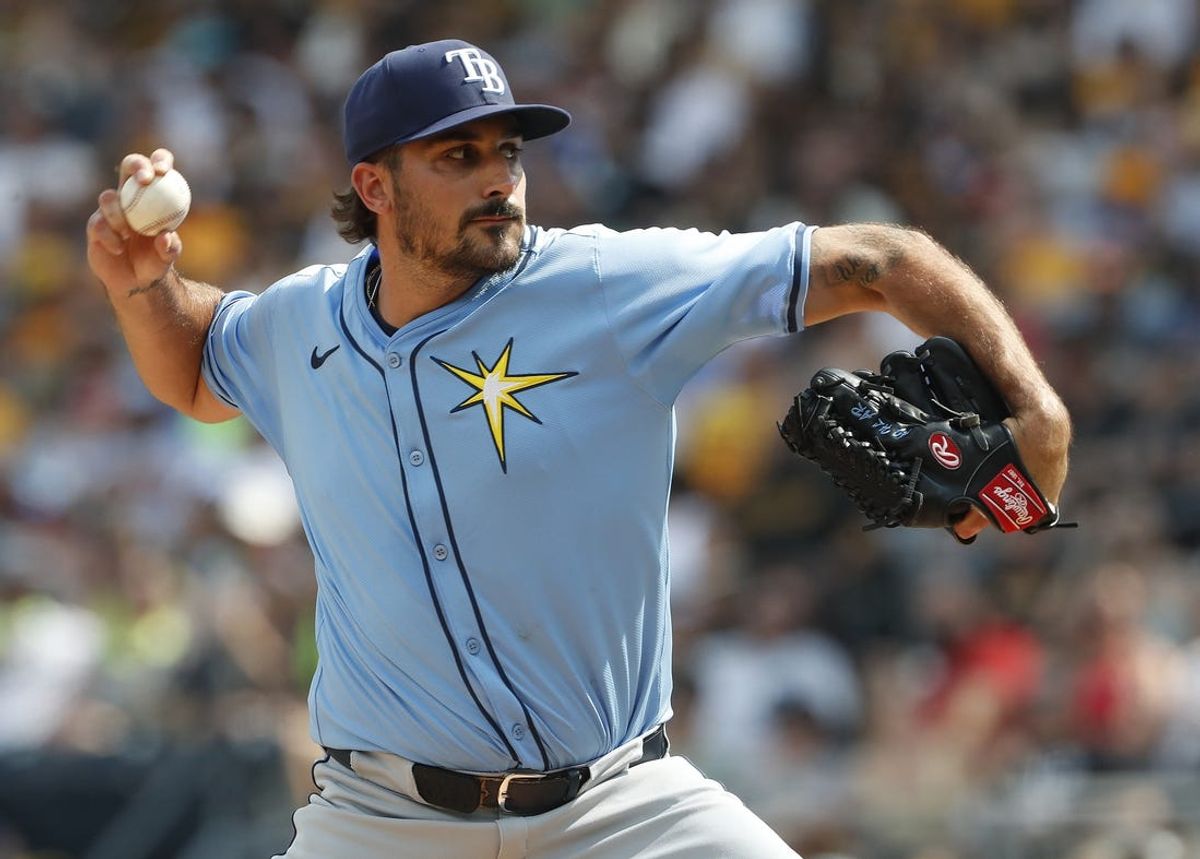Jun 22, 2024; Pittsburgh, Pennsylvania, USA;  Tampa Bay Rays starting pitcher Zach Eflin (24) delivers a pitch against the Pittsburgh Pirates during the first inning at PNC Park. Mandatory Credit: Charles LeClaire-USA TODAY Sports