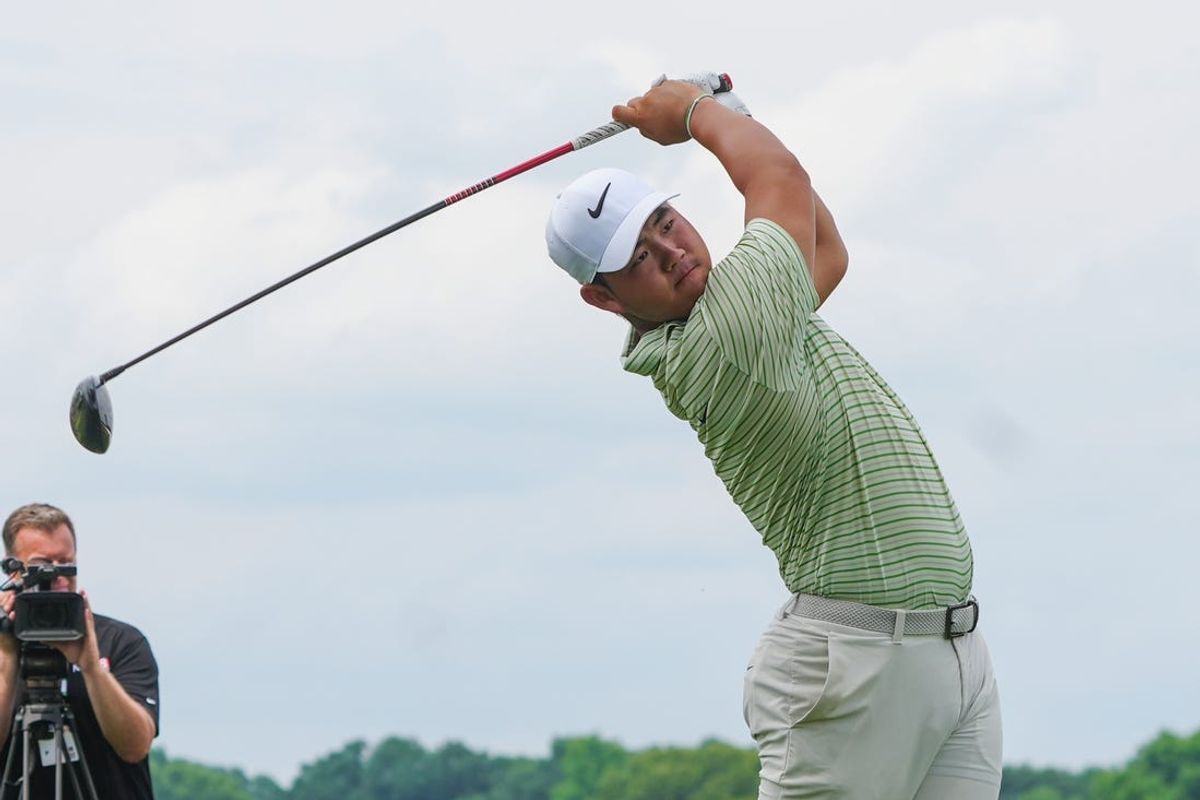 Jun 22, 2024; Cromwell, Connecticut, USA; Tom Kim tees off on the third hole during the third round of the Travelers Championship golf tournament at TPC River Highlands. Mandatory Credit: Gregory Fisher-USA TODAY Sports