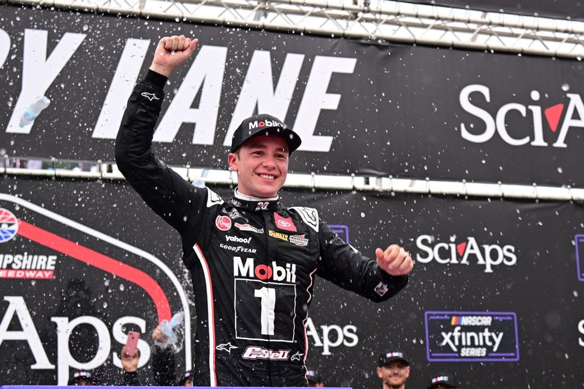 Jun 22, 2024; Loudon, New Hampshire, USA; NASCAR Xfinity Series driver Christopher Bell (20) celebrates winning the Sci Aps 200 at New Hampshire Motor Speedway. Mandatory Credit: Eric Canha-USA TODAY Sports