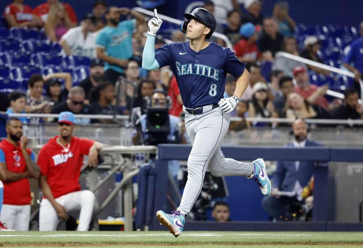 Jun 22, 2024; Miami, Florida, USA;  Seattle Mariners right fielder Dominic Canzone (8) celebrates after hitting a solo home run against the Miami Marlins in the fifth inning at loanDepot Park. Mandatory Credit: Rhona Wise-USA TODAY Sports