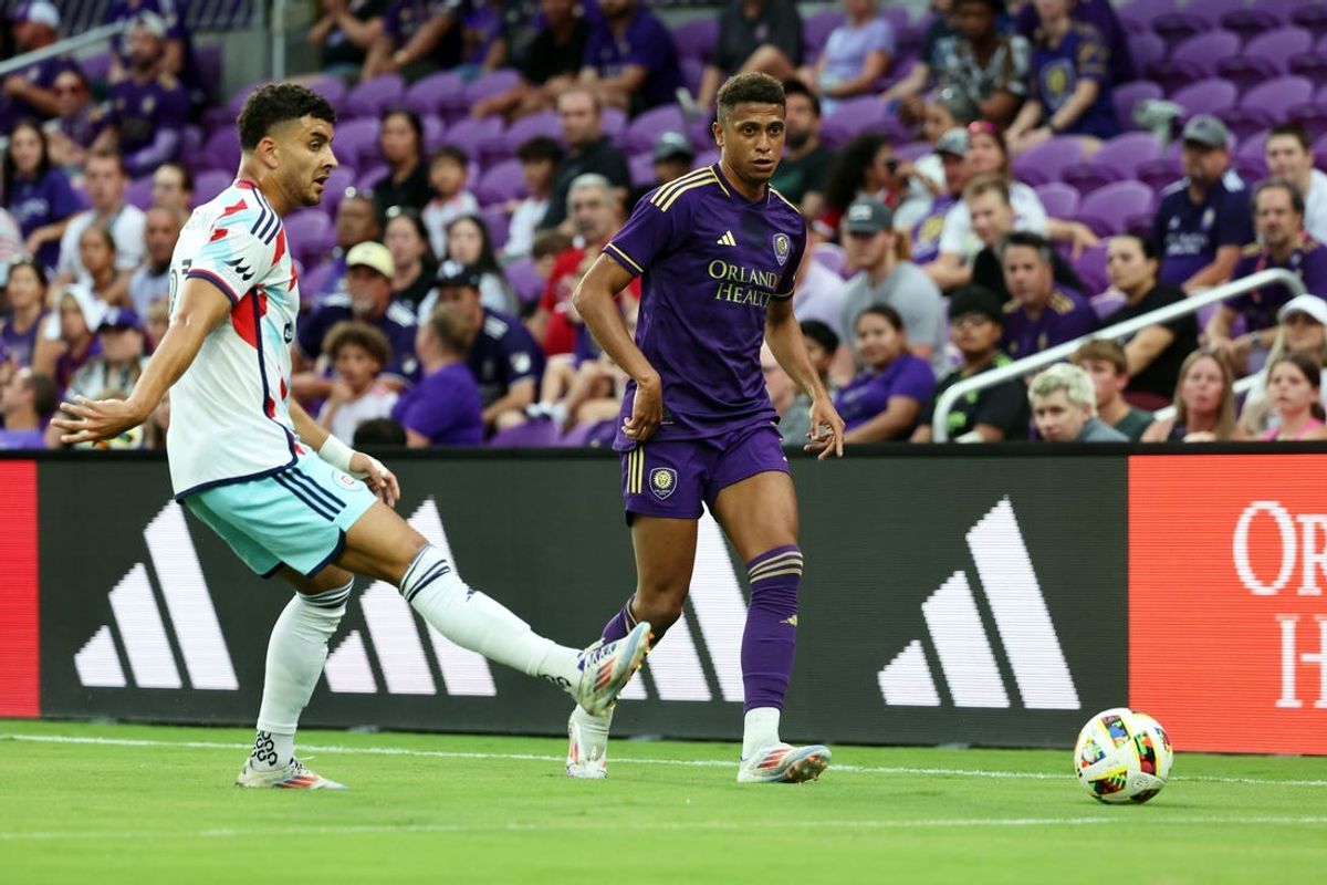 Jun 22, 2024; Orlando, Florida, USA; Orlando City defender Rafael Santos (3) and Chicago Fire FC defender Allan Arigoni (27) defend the ball during the first half at Inter&Co Stadium. Mandatory Credit: Kim Klement Neitzel-USA TODAY Sports
