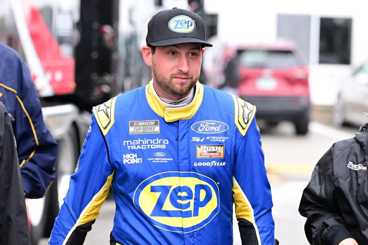 Jun 22, 2024; Loudon, New Hampshire, USA; NASCAR Cup Series driver Chase Briscoe (14) heads to the garage before practice for the USA Today 301 at New Hampshire Motor Speedway. Mandatory Credit: Eric Canha-USA TODAY Sports