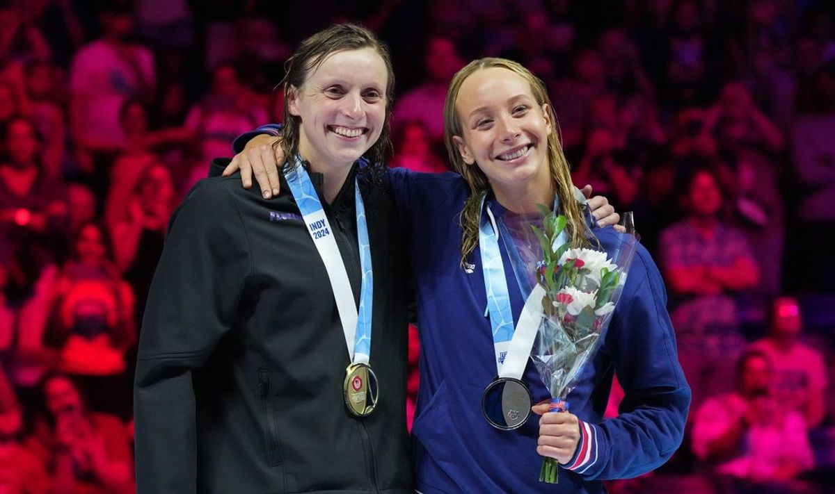 Katie Ledecky and Paige Madden pose for a photo during the medal ceremony for the 800-meter freestyle final, Saturday, June 22, 2024, during the eighth day of the U.S. Olympic Team Swimming Trials at Lucas Oil Stadium in Indianapolis.