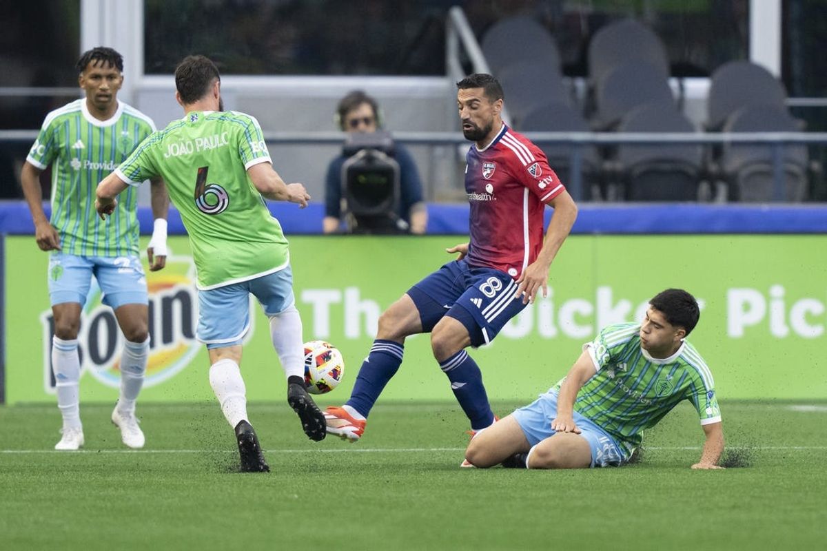 Jun 22, 2024; Seattle, Washington, USA; FC Dallas midfielder Sebastian Lletget (8) battles Seattle Sounders FC midfielder Joao Paulo (6) and midfielder Obed Vargas (18) for the ball during the first half at Lumen Field. Mandatory Credit: Stephen Brashear-USA TODAY Sports