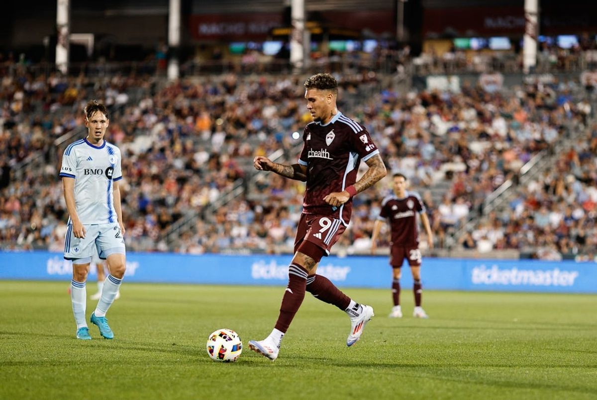 Jun 22, 2024; Commerce City, Colorado, USA; Colorado Rapids forward Rafael Navarro (9)dribbles the ball during the second half against CF Montreal at Dick's Sporting Goods Park. Mandatory Credit: Isaiah J. Downing-USA TODAY Sports