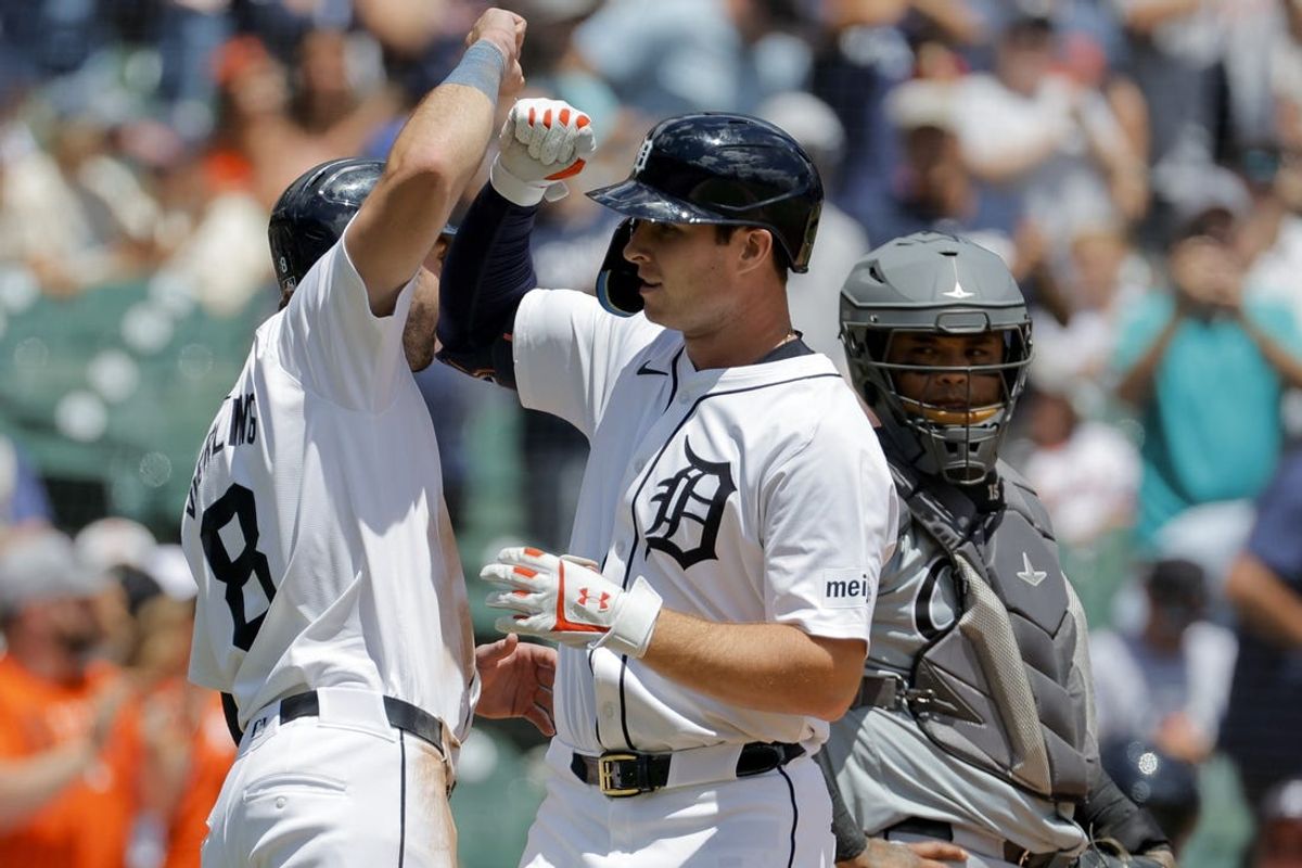 Jun 23, 2024; Detroit, Michigan, USA; Detroit Tigers second baseman Colt Keith (33) celebrates with third baseman Matt Vierling (8) after hitting a two-run home run in the first inning against the Chicago White Sox at Comerica Park. Mandatory Credit: Rick Osentoski-USA TODAY Sports
