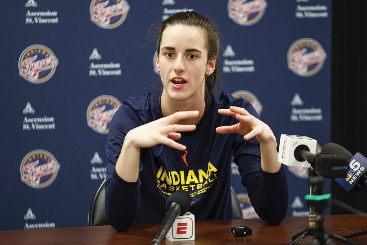 Jun 23, 2024; Chicago, Illinois, USA; Indiana Fever guard Caitlin Clark (22) speaks during a press conference before a game against the Chicago Sky at Wintrust Arena. Mandatory Credit: Kamil Krzaczynski-Imagn Images