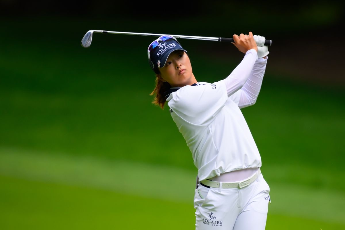 Jun 23, 2024; Sammamish, Washington, USA; Jin Young Ko hits from the fairway on hole two during the final round of the KPMG Women's PGA Championship golf tournament. Mandatory Credit: Steven Bisig-Imagn Images