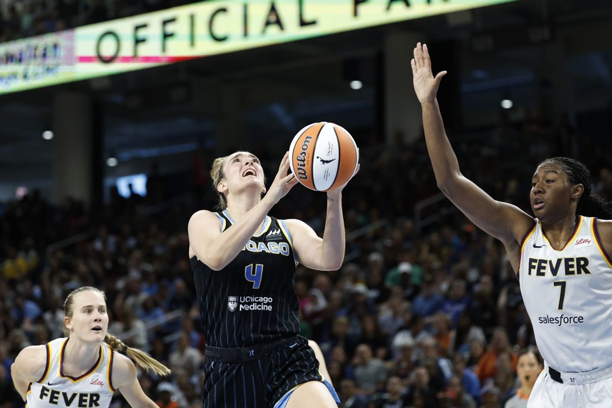 Jun 23, 2024; Chicago, Illinois, USA; Chicago Sky guard Marina Mabrey (4) goes to the basket against the Indiana Fever during the second half of a basketball game at Wintrust Arena. Mandatory Credit: Kamil Krzaczynski-USA TODAY Sports