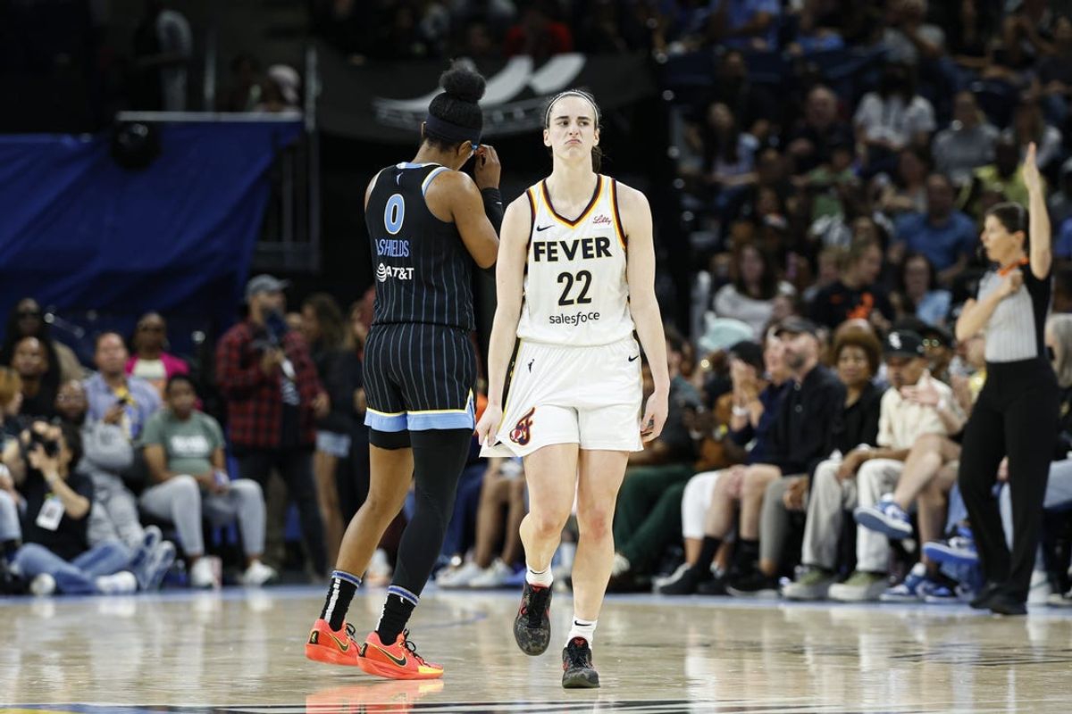 Jun 23, 2024; Chicago, Illinois, USA; Indiana Fever guard Caitlin Clark (22) reacts after scoring against the Chicago Sky during the second half of a basketball game at Wintrust Arena. Mandatory Credit: Kamil Krzaczynski-USA TODAY Sports