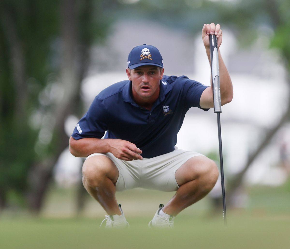 Bryson DeChambeau of Crushers GC lines up a putt during the final round of the LIV Golf Tournament at The Grove Sunday, June 23, 2024 in College Grove.
