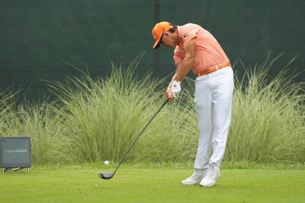 Jun 23, 2024; Cromwell, Connecticut, USA; Rickie Fowler hits the ball from the tee on the fourth hole during the final round of the Travelers Championship golf tournament at TPC River Highlands. Mandatory Credit: Gregory Fisher-USA TODAY Sports