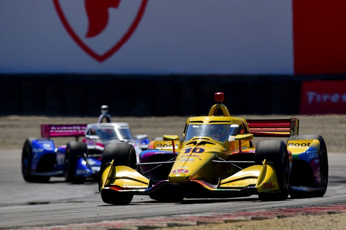 Jun 23, 2024; Salinas, California, USA; Chip Ganassi Racing driver Alex Palou (10) of Spain leads Meyer Shank Racing driver Felix Rosenqvist (60) of Sweden during the Grand Prix Of Monterey at WeatherTech Raceway Laguna Seca. Mandatory Credit: Gary A. Vasquez-USA TODAY Sports