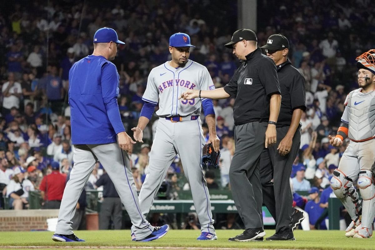 Jun 23, 2024; Chicago, Illinois, USA; New York Mets pitcher Edwin Díaz (39) is ejected during the ninth inning against the Chicago Cubs at Wrigley Field. Mandatory Credit: David Banks-USA TODAY Sports