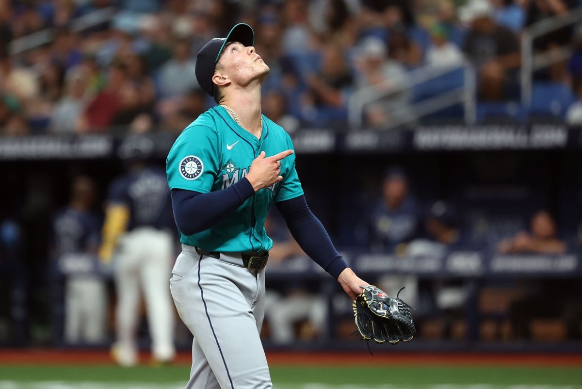 Jun 24, 2024; St. Petersburg, Florida, USA; Seattle Mariners pitcher Bryan Woo (22) reacts at the end of the first inning against the Tampa Bay Rays at Tropicana Field. Mandatory Credit: Kim Klement Neitzel-USA TODAY Sports
