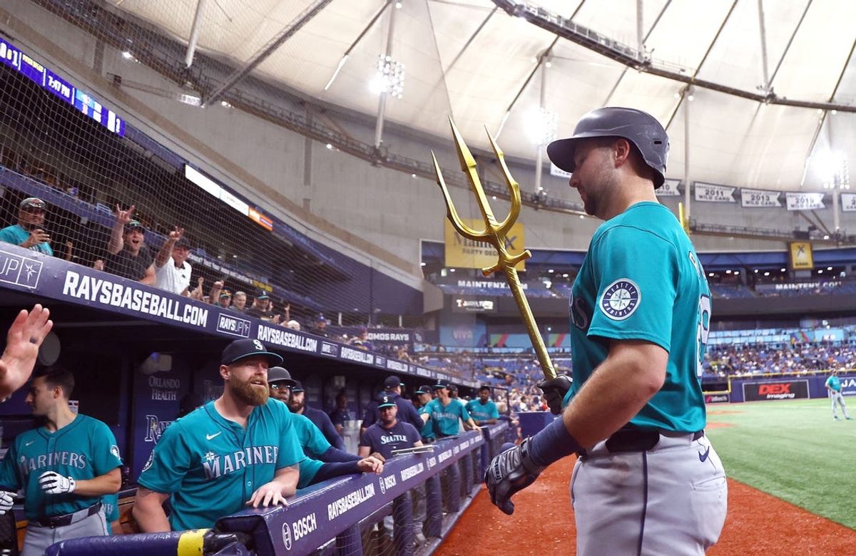 Jun 24, 2024; St. Petersburg, Florida, USA;  Seattle Mariners catcher Cal Raleigh (29) is congratulated after he hit a home run against the Tampa Bay Rays during the fourth inning at Tropicana Field. Mandatory Credit: Kim Klement Neitzel-USA TODAY Sports