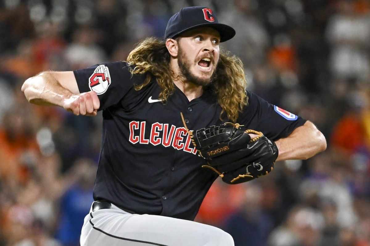 Jun 24, 2024; Baltimore, Maryland, USA;  Cleveland Guardians pitcher Scott Barlow (58) reacts after earning a save in the ninth inning against the Baltimore Orioles at Oriole Park at Camden Yards. Mandatory Credit: Tommy Gilligan-USA TODAY Sports