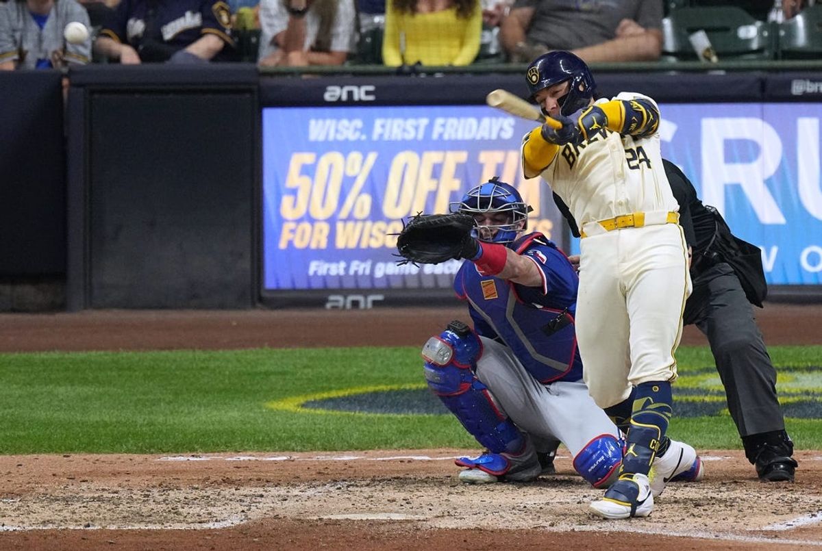 Milwaukee Brewers catcher William Contreras (24) hits a double during the seventh inning of their game against the Texas Rangers Monday, June 24, 2024 at American Family Field in Milwaukee, Wisconsin.