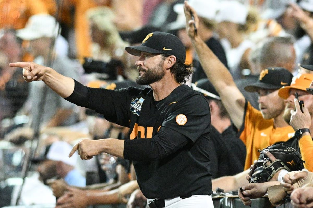 Jun 24, 2024; Omaha, NE, USA;  Tennessee Volunteers head coach Tony Vitello signals the team against the Tennessee Volunteers during the ninth inning at Charles Schwab Field Omaha. Mandatory Credit: Steven Branscombe-USA TODAY Sports